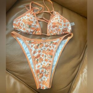 Orange Floral Bikini size XL (runs small) never worn